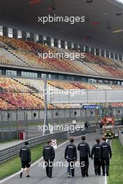 16.04.2009 Shanghai, China,  Jenson Button (GBR), Brawn GP, walks the circuit - Formula 1 World Championship, Rd 3, Chinese Grand Prix, Thursday