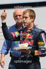 08.05.2009 Barcelona, Spain,  Sebastian Vettel (GER), Red Bull Racing with his lunch - Formula 1 World Championship, Rd 5, Spanish Grand Prix, Friday Practice