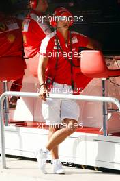 21.08.2009 Valencia, Spain,  Michael Schumacher (GER), Test Driver, Scuderia Ferrari on the pit wall - Formula 1 World Championship, Rd 11, European Grand Prix, Friday Practice