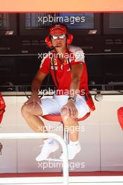 21.08.2009 Valencia, Spain,  Michael Schumacher (GER), Test Driver, Scuderia Ferrari on the pit wall - Formula 1 World Championship, Rd 11, European Grand Prix, Friday Practice