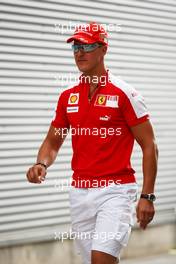 21.08.2009 Valencia, Spain,  Michael Schumacher (GER), Test Driver, Scuderia Ferrari on the way to pit wall - Formula 1 World Championship, Rd 11, European Grand Prix, Friday Practice