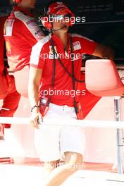 21.08.2009 Valencia, Spain,  Michael Schumacher (GER), Test Driver, Scuderia Ferrari on the pit wall - Formula 1 World Championship, Rd 11, European Grand Prix, Friday Practice