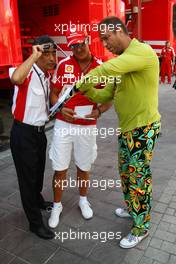 21.08.2009 Valencia, Spain,  Michael Schumacher (GER), Scuderia Ferrari, meets Kai Ebel (RTL TV) shows his new whatch collection - Formula 1 World Championship, Rd 11, European Grand Prix, Friday Practice