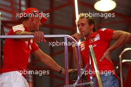 21.08.2009 Valencia, Spain,  Michael Schumacher (GER), Test Driver, Scuderia Ferrari, Luca Badoer (ITA), Scuderia Ferrari - Formula 1 World Championship, Rd 11, European Grand Prix, Friday