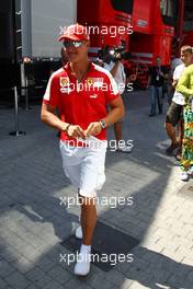 21.08.2009 Valencia, Spain,  Michael Schumacher (GER), Scuderia Ferrari, meets Kai Ebel (RTL TV) shows his new whatch collection - Formula 1 World Championship, Rd 11, European Grand Prix, Friday Practice