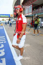 21.08.2009 Valencia, Spain,  Michael Schumacher (GER), Test Driver, Scuderia Ferrari on the way to pit wall - Formula 1 World Championship, Rd 11, European Grand Prix, Friday Practice