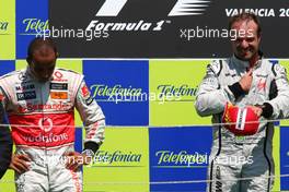 23.08.2009 Valencia, Spain,  Lewis Hamilton (GBR), McLaren Mercedes and 1st place Rubens Barrichello (BRA), Brawn GP - Formula 1 World Championship, Rd 11, European Grand Prix, Sunday Podium