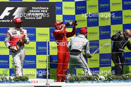 23.08.2009 Valencia, Spain,  1st place Rubens Barrichello (BRA), Brawn GP with 2nd place Lewis Hamilton (GBR), McLaren Mercedes and 3rd place Kimi Raikkonen (FIN), Räikkönen, Scuderia Ferrari - Formula 1 World Championship, Rd 11, European Grand Prix, Sunday Podium