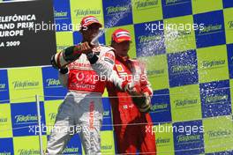 23.08.2009 Valencia, Spain,  2nd place Lewis Hamilton (GBR), McLaren Mercedes and Kimi Raikkonen (FIN), Räikkönen, Scuderia Ferrari  - Formula 1 World Championship, Rd 11, European Grand Prix, Sunday Podium