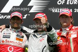 23.08.2009 Valencia, Spain,  Lewis Hamilton (GBR), McLaren Mercedes, Rubens Barrichello (BRA), Brawn GP and Kimi Raikkonen (FIN), Räikkönen, Scuderia Ferrari  - Formula 1 World Championship, Rd 11, European Grand Prix, Sunday Podium