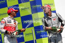 23.08.2009 Valencia, Spain,  Lewis Hamilton (GBR), McLaren Mercedes and 1st place Rubens Barrichello (BRA), Brawn GP - Formula 1 World Championship, Rd 11, European Grand Prix, Sunday Podium