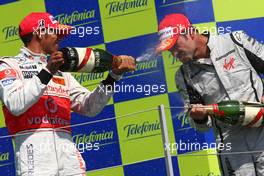 23.08.2009 Valencia, Spain,  Lewis Hamilton (GBR), McLaren Mercedes and 1st place Rubens Barrichello (BRA), Brawn GP - Formula 1 World Championship, Rd 11, European Grand Prix, Sunday Podium