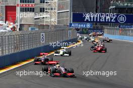 23.08.2009 Valencia, Spain,  Race Start, Lewis Hamilton (GBR), McLaren Mercedes leads Heikki Kovalainen (FIN), McLaren Mercedes - Formula 1 World Championship, Rd 11, European Grand Prix, Sunday Race