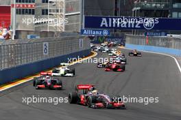 23.08.2009 Valencia, Spain,  Race Start, Lewis Hamilton (GBR), McLaren Mercedes leads Heikki Kovalainen (FIN), McLaren Mercedes - Formula 1 World Championship, Rd 11, European Grand Prix, Sunday Race