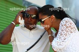 22.08.2009 Valencia, Spain,  Anthony Hamilton (GBR), Father of Lewis Hamilton and Nicole Scherzinger (USA), Singer in the Pussycat Dolls and girlfriend of Lewis Hamilton listen in to Lewis on the radio (GBR) - Formula 1 World Championship, Rd 11, European Grand Prix, Saturday Qualifying