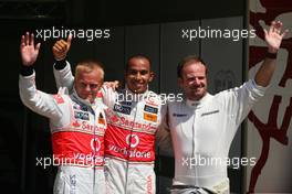 22.08.2009 Valencia, Spain,  Heikki Kovalainen (FIN), McLaren Mercedes, Lewis Hamilton (GBR), McLaren Mercedes and Rubens Barrichello (BRA), Brawn GP  - Formula 1 World Championship, Rd 11, European Grand Prix, Saturday Qualifying