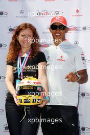 20.08.2009 Valencia, Spain,  Lewis Hamilton (GBR), McLaren Mercedes, helmets have the name of Johnny Walker prize winners - Formula 1 World Championship, Rd 11, European Grand Prix, Thursday