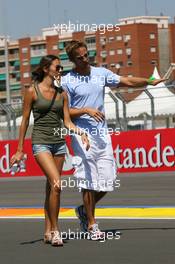 20.08.2009 Valencia, Spain,  Jenson Button (GBR), Brawn GP and his girlfriend Jessica Michibata (JPN)- Formula 1 World Championship, Rd 11, European Grand Prix, Thursday