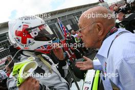 21.06.2009 Silverstone, England,  Jenson Button (GBR), Brawn GP and Sir Stirling Moss (GBR) - Formula 1 World Championship, Rd 8, British Grand Prix, Sunday Pre-Race Grid