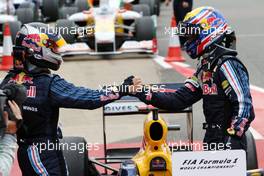 21.06.2009 Silverstone, England,  Sebastian Vettel (GER), Red Bull Racing, Mark Webber (AUS), Red Bull Racing - Formula 1 World Championship, Rd 8, British Grand Prix, Sunday Podium