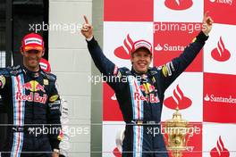 21.06.2009 Silverstone, England,  Sebastian Vettel (GER), Red Bull Racing and Mark Webber (AUS), Red Bull Racing  - Formula 1 World Championship, Rd 8, British Grand Prix, Sunday Podium