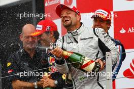 21.06.2009 Silverstone, England,  1st, winner, Sebastian Vettel (GER), Red Bull Racing and 3rd, Rubens Barrichello (BRA), Brawn GP - Formula 1 World Championship, Rd 8, British Grand Prix, Sunday Podium