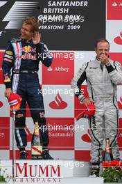 21.06.2009 Silverstone, England,  Sebastian Vettel (GER), Red Bull Racing and Rubens Barrichello (BRA), Brawn GP  - Formula 1 World Championship, Rd 8, British Grand Prix, Sunday Podium
