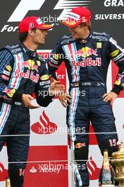 21.06.2009 Silverstone, England,  Mark Webber (AUS), Red Bull Racing and Sebastian Vettel (GER), Red Bull Racing  - Formula 1 World Championship, Rd 8, British Grand Prix, Sunday Podium