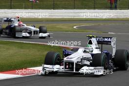 21.06.2009 Silverstone, England,  Nick Heidfeld (GER), BMW Sauber F1 Team, F1.09 leads Robert Kubica (POL), BMW Sauber F1 Team, F1.09 - Formula 1 World Championship, Rd 8, British Grand Prix, Sunday Race