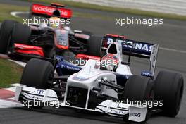 21.06.2009 Silverstone, England,  Robert Kubica (POL), BMW Sauber F1 Team, F1.09 leads Lewis Hamilton (GBR), McLaren Mercedes, MP4-24 - Formula 1 World Championship, Rd 8, British Grand Prix, Sunday Race