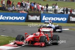 21.06.2009 Silverstone, England,  Kimi Raikkonen (FIN), Räikkönen, Scuderia Ferrari, F60 leads Nico Rosberg (GER), Williams F1 Team, FW31 - Formula 1 World Championship, Rd 8, British Grand Prix, Sunday Race