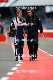 20.06.2009 Silverstone, England,  Sebastian Vettel (GER), Red Bull Racing with Guillaume Rocquelin, Red Bull Racing Race Engineer of Sebastian Vettel  - Formula 1 World Championship, Rd 8, British Grand Prix, Saturday Practice