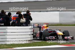 10.07.2009 Nürburg, Germany,  Photographers photograph Mark Webber (AUS), Red Bull Racing - Formula 1 World Championship, Rd 9, German Grand Prix, Friday Practice
