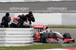 10.07.2009 Nürburg, Germany,  Photographers photograph Heikki Kovalainen (FIN), McLaren Mercedes, MP4-24 - Formula 1 World Championship, Rd 9, German Grand Prix, Friday Practice
