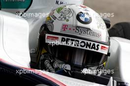 10.07.2009 Nürburg, Germany,  Nick Heidfeld (GER), BMW Sauber F1 Team with a new helmet design - Formula 1 World Championship, Rd 9, German Grand Prix, Friday Practice