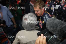 12.07.2009 NŸrburg, Germany,  Bernie Ecclestone (GBR) and Sebastian Vettel (GER), Red Bull Racing  - Formula 1 World Championship, Rd 9, German Grand Prix, Sunday Pre-Race Grid
