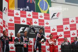 12.07.2009 Nürburg, Germany,  2nd place Sebastian Vettel (GER), Red Bull Racing with 1st place Mark Webber (AUS), Red Bull Racing and 3rd place Felipe Massa (BRA), Scuderia Ferrari - Formula 1 World Championship, Rd 9, German Grand Prix, Sunday Podium