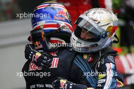 12.07.2009 NŸrburg, Germany,  Mark Webber (AUS), Red Bull Racing and Sebastian Vettel (GER), Red Bull Racing - Formula 1 World Championship, Rd 9, German Grand Prix, Sunday Podium
