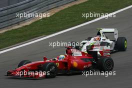 12.07.2009 NŸrburg, Germany,  Felipe Massa (BRA), Scuderia Ferrari and Rubens Barrichello (BRA), Brawn GP  - Formula 1 World Championship, Rd 9, German Grand Prix, Sunday Race