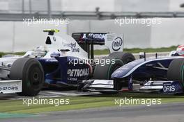 12.07.2009 Nürburg, Germany,  Nick Heidfeld (GER), BMW Sauber F1 Team and Kazuki Nakajima (JPN), Williams F1 Team - Formula 1 World Championship, Rd 9, German Grand Prix, Sunday Race