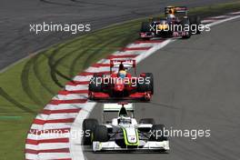 12.07.2009 Nürburg, Germany,  Jenson Button (GBR), Brawn GP, BGP001, BGP 001 leads Felipe Massa (BRA), Scuderia Ferrari, F60 - Formula 1 World Championship, Rd 9, German Grand Prix, Sunday Race