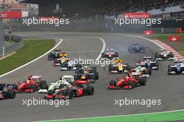 12.07.2009 Nürburg, Germany,  Start of the race with Heikki Kovalainen (FIN), McLaren Mercedes, Felipe Massa (BRA), Scuderia Ferrari, Jenson Button (GBR), Brawn GP, Kimi Raikkonen (FIN), Räikkönen, Scuderia Ferrari - Formula 1 World Championship, Rd 9, German Grand Prix, Sunday Race