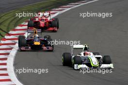 12.07.2009 Nürburg, Germany,  Rubens Barrichello (BRA), Brawn GP, BGP001, BGP 001leads Sebastian Vettel (GER), Red Bull Racing, RB5 - Formula 1 World Championship, Rd 9, German Grand Prix, Sunday Race