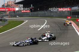 12.07.2009 Nürburg, Germany,  Nico Rosberg (GER), Williams F1 Team, Robert Kubica (POL),  BMW Sauber F1 Team, Giancarlo Fisichella (ITA), Force India F1 Team - Formula 1 World Championship, Rd 9, German Grand Prix, Sunday Race