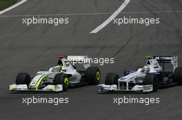 12.07.2009 NŸrburg, Germany,  Jenson Button (GBR), Brawn GP and Nick Heidfeld (GER), BMW Sauber F1 Team  - Formula 1 World Championship, Rd 9, German Grand Prix, Sunday Race