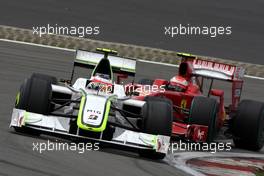 12.07.2009 Nürburg, Germany,  Rubens Barrichello (BRA), Brawn GP, BGP001, BGP 001 leads Kimi Raikkonen (FIN), Räikkönen, Scuderia Ferrari, F60 - Formula 1 World Championship, Rd 9, German Grand Prix, Sunday Race
