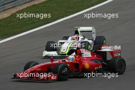 12.07.2009 NŸrburg, Germany,  Felipe Massa (BRA), Scuderia Ferrari and Rubens Barrichello (BRA), Brawn GP  - Formula 1 World Championship, Rd 9, German Grand Prix, Sunday Race