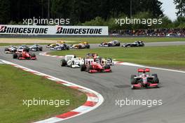12.07.2009 Nürburg, Germany,  Heikki Kovalainen (FIN), McLaren Mercedes, Felipe Massa (BRA), Scuderia Ferrari - Formula 1 World Championship, Rd 9, German Grand Prix, Sunday Race