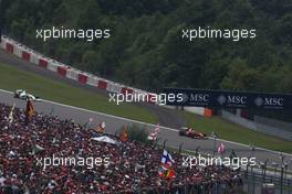 12.07.2009 Nürburg, Germany,  Felipe Massa (BRA), Scuderia Ferrari and Rubens Barrichello (BRA), Brawn GP - Formula 1 World Championship, Rd 9, German Grand Prix, Sunday Race