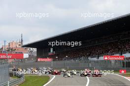 12.07.2009 Nürburg, Germany,  Start of the race with Mark Webber (AUS), Red Bull Racing, Rubens Barrichello (BRA), Brawn GP, Lewis Hamilton (GBR), McLaren Mercedes - Formula 1 World Championship, Rd 9, German Grand Prix, Sunday Race